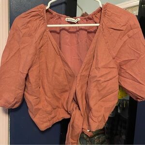 Mauve colored cropped tie front shirt